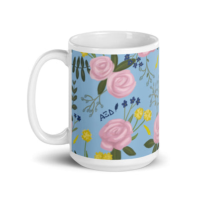 Alpha Xi Delta Floral Pattern Light Blue Glossy Mug in 15 oz size with handle on left