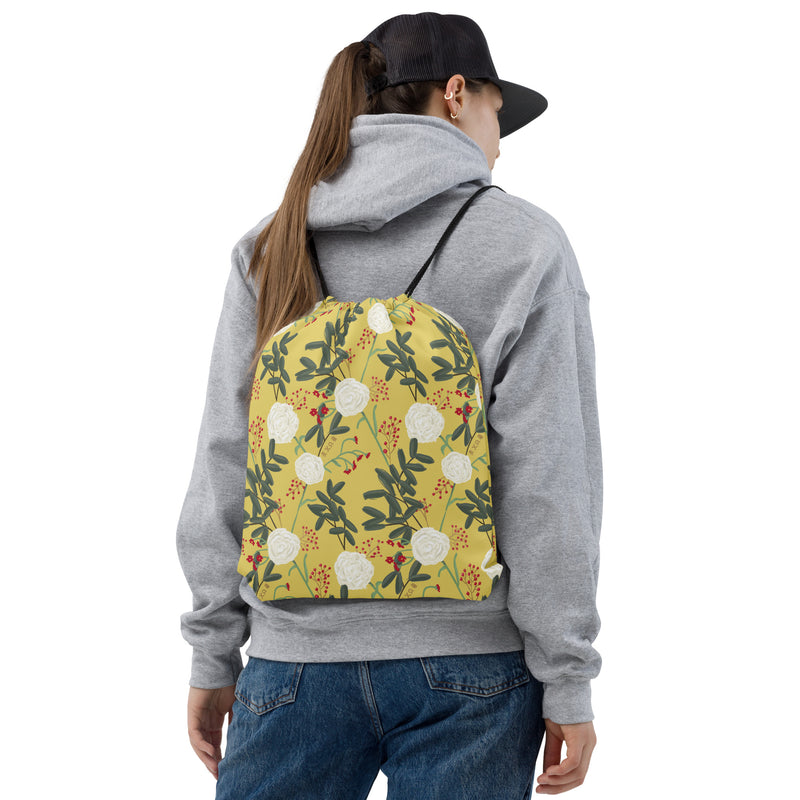 Chi Omega White Carnation Floral Drawstring Bag shown on model