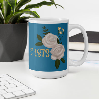 Delta Gamma 1873 Founding Year Blue Glossy Mug shown in 15 oz size in office