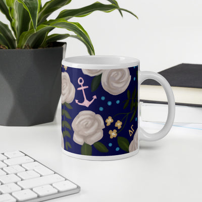 Delta Gamma Floral Print Navy Blue Glossy Mug shown in 11 oz size in office