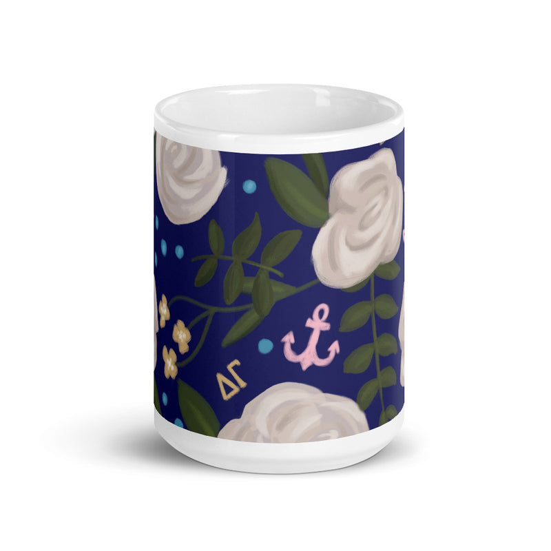 Delta Gamma Floral Print Navy Blue Glossy Mug showing print wrapping around mug in 15 oz size