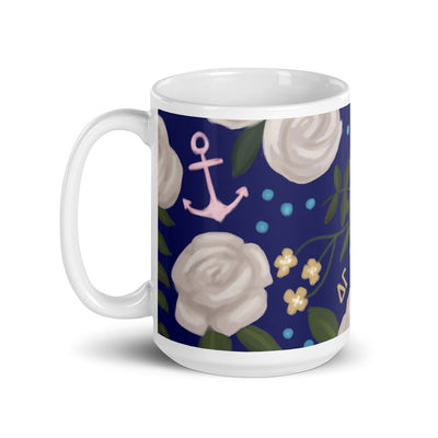 Delta Gamma Floral Print Navy Blue Glossy Mug in 15 oz size with handle on left