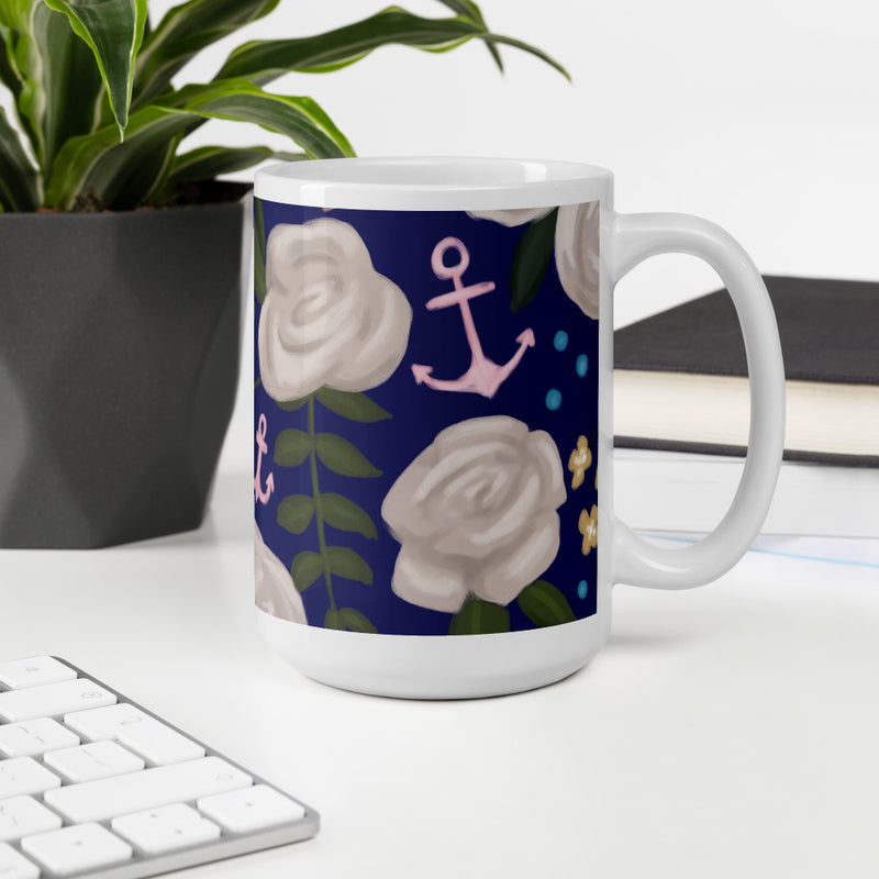 Delta Gamma Floral Print Navy Blue Glossy Mug showing 15 oz size in office