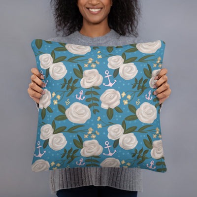 Delta Gamma Greek Letters Pillow showing floral print on back held up by woman