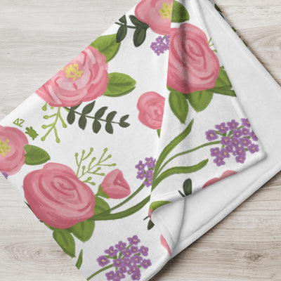 Delta Zeta Pink Rose Floral Throw Blanket showing white reverse side