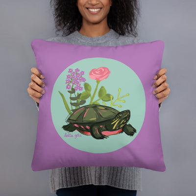 Delta Zeta Turtle Mascot Pillow shown in model's hands