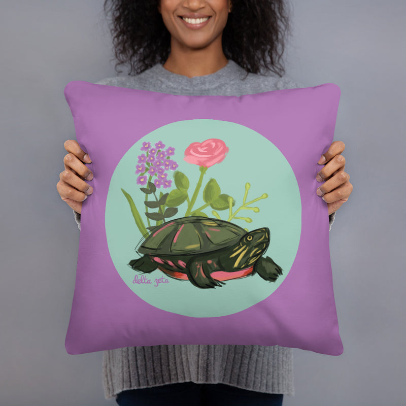 Delta Zeta Turtle Mascot Pillow shown in model&