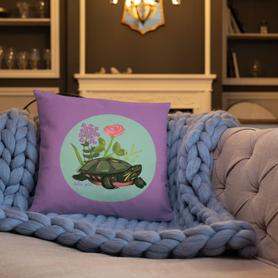 Delta Zeta Turtle Mascot Pillow shown on couch