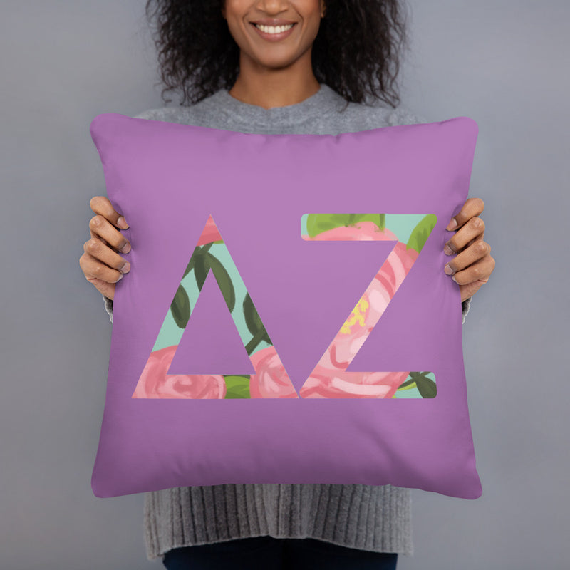Delta Zeta Greek Letters Purple Pillow filled with floral print
