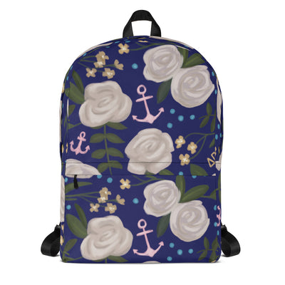 Delta Gamma white rose floral print backpack with a blue background shown in full view