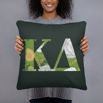 Kappa Delta Greek Letters Dark Green Pillow in model's hands