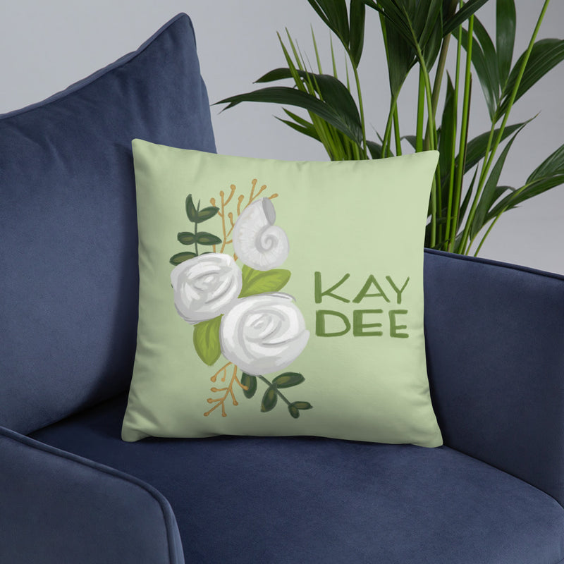 Kappa Delta Kay Dee Light Green Pillow on blue chair
