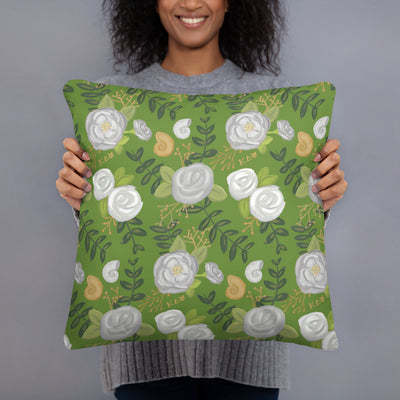 Kappa Delta White Rose Floral Print Pillow in model's hands