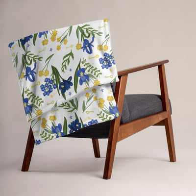 Kappa Kappa Gamma Fleur de Lis and Key Throw Blanket in white shown on chair