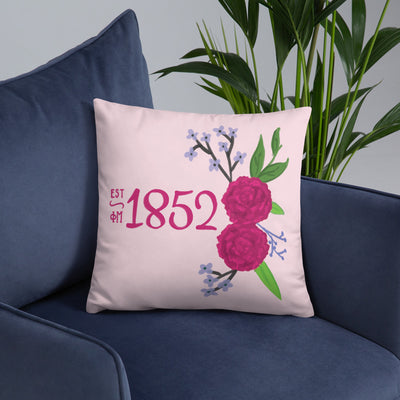 Phi Mu 1852 Founding Date Pillow shown in lifestyle setting on chair
