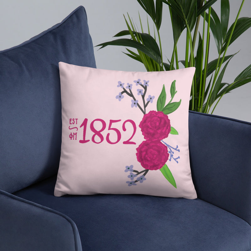 Phi Mu 1852 Founding Date Pillow shown in lifestyle setting on chair