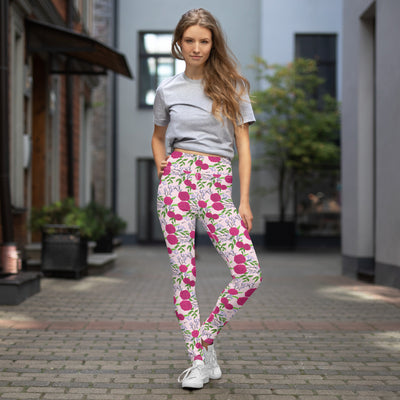 Phi Mu Rose-Colored Carnation Floral Yoga Leggings shown on model in outdoor setting