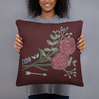 Pi Beta Phi Wine Carnation Design Pillow in model's hands