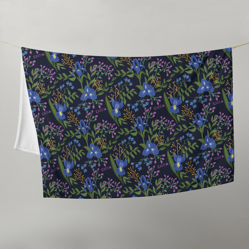 Sigma Alpha Epsilon Pi Floral Throw Blanket shown hanging