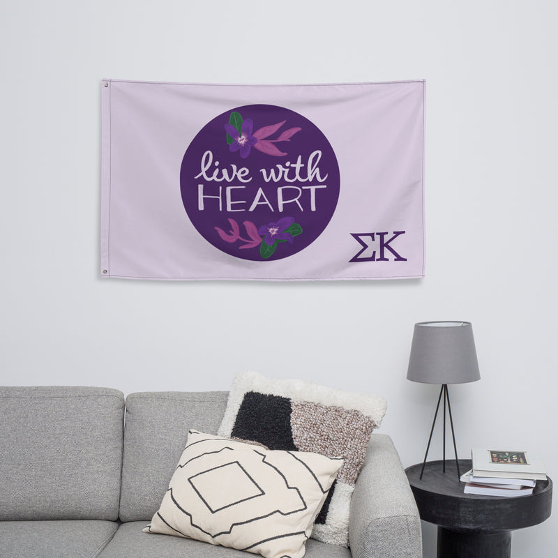 Sigma Kappa Live With Heart Flag shown in living room