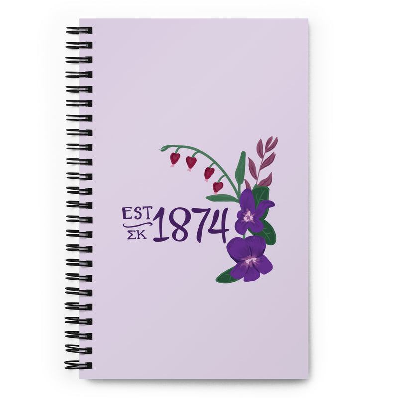 Sigma Kappa 1874 Spiral Notebook showing hand drawn design in lavender in full view