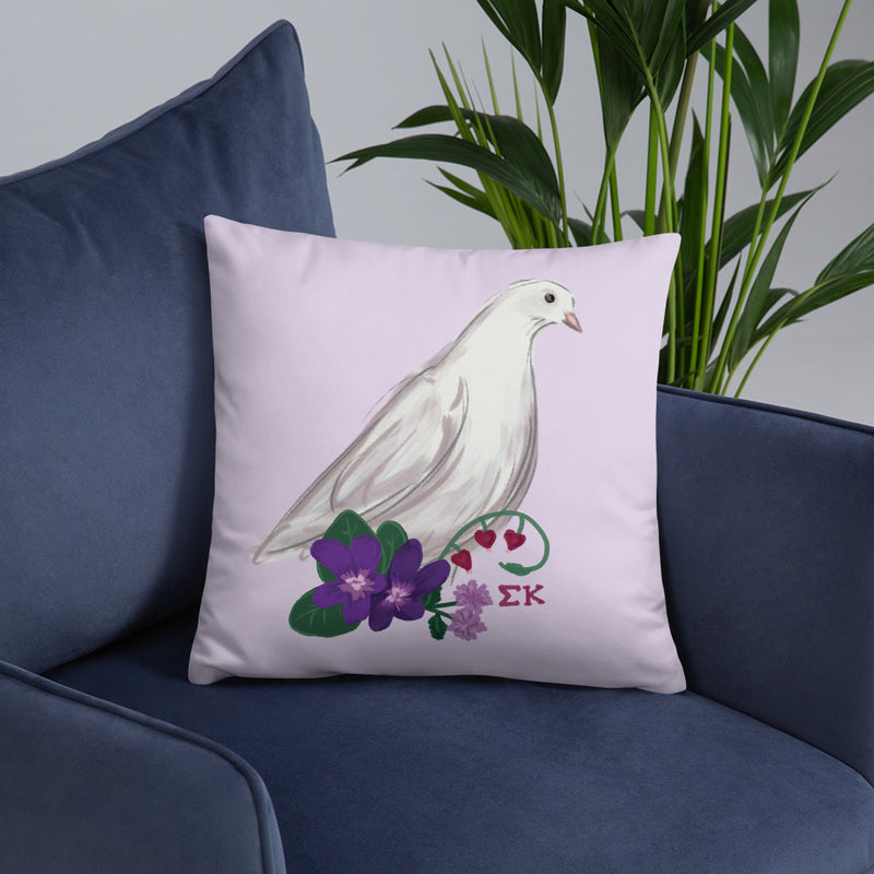 Sigma Kappa Dove Mascot Reversible Pillow on chair