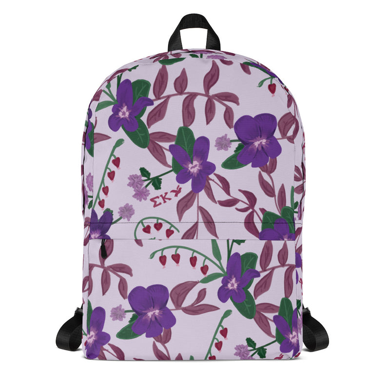 Sigma Kappa violet print backpack with a light purple background showing hand-drawn design