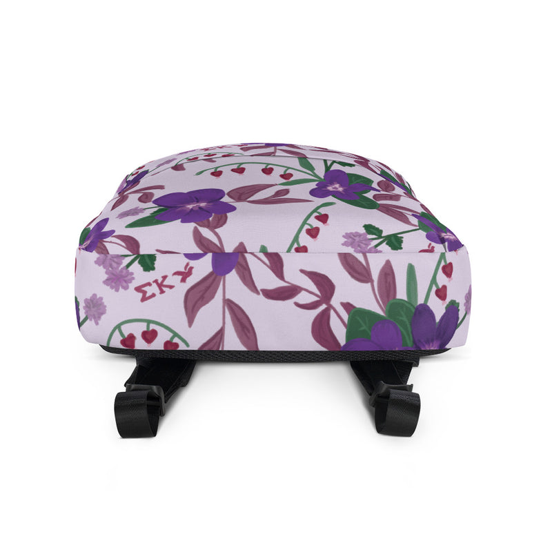 Sigma Kappa violet print backpack in lavender showing bottom of bag