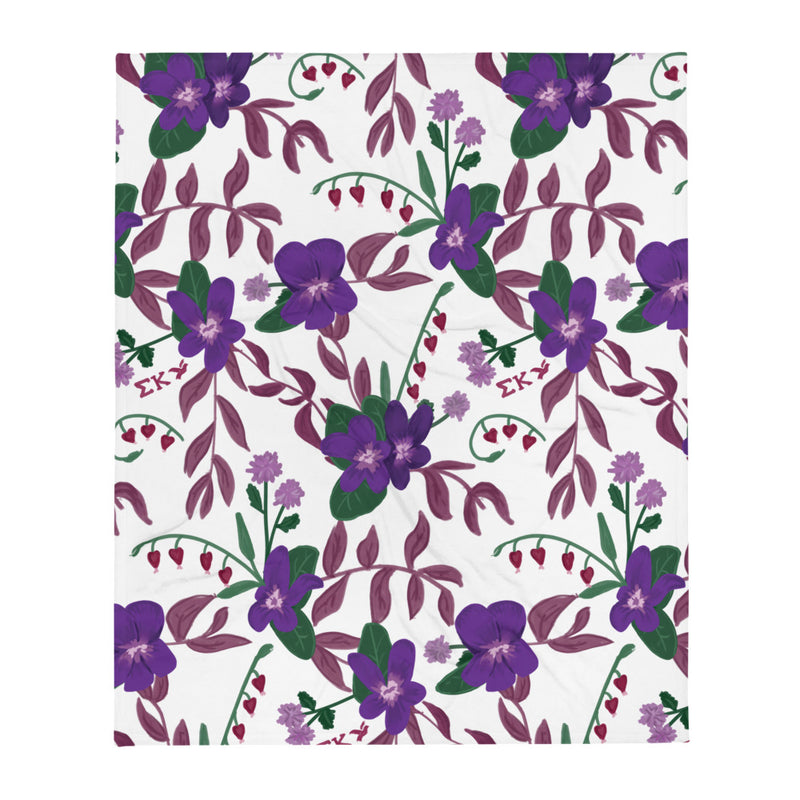 Sigma Kappa Violet Floral Print Blanket in white with violet floral print shown in full view
