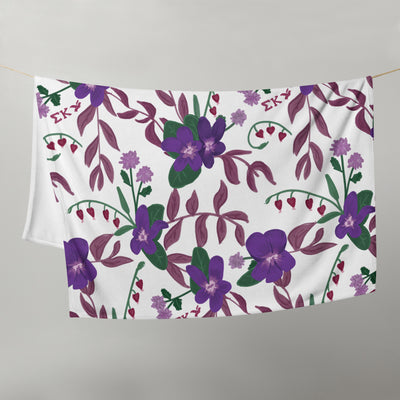Our Sigma Kappa violet print blanket is super cute and comfy.