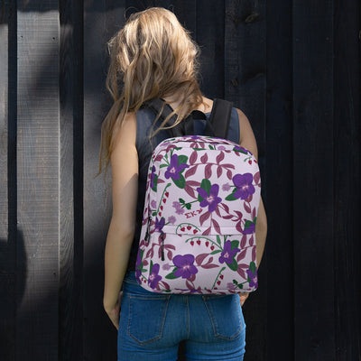 Sigma Kappa violet print backpack in lavender shown on model's back