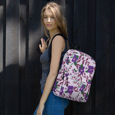 Sigma Kappa violet print backpack with a light purple background on model