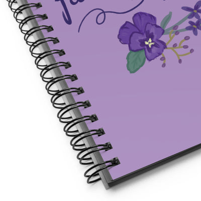 Tri Sigma Motto Notebook showing product details and Tri Sig flower