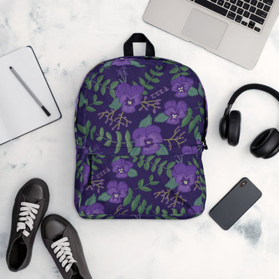 Tri Sigma violet floral print backpack with a purple background.