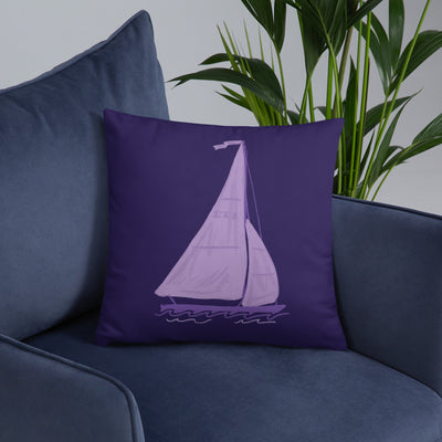 Tri Sigma Sailboat Mascot Pillow on chair