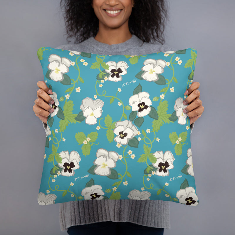 Zeta Tau Alpha Greek Letters Pillow, Turquoise shown on reverse side with woman holding