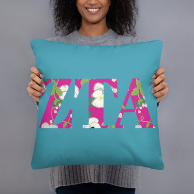 Zeta Tau Alpha Greek Letters Pillow, Turquoise shown with woman