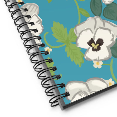 Close up view of Zeta Tau Alpha Violet Floral Print Spiral Notebook, Turquoise