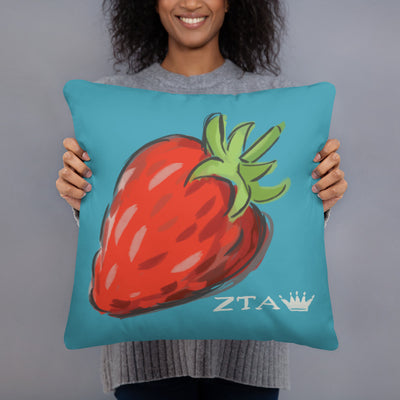 Zeta Tau Alpha Sorority Pillow with strawberry, crown and ZTA design in model's hands