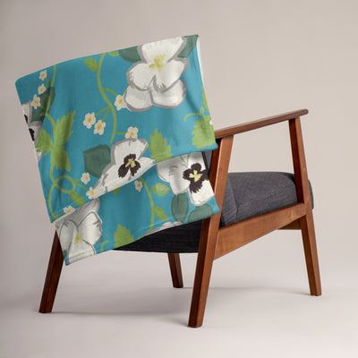 Zeta Tau Alpha White Violet Throw Blanket, Turquoise shown over chair