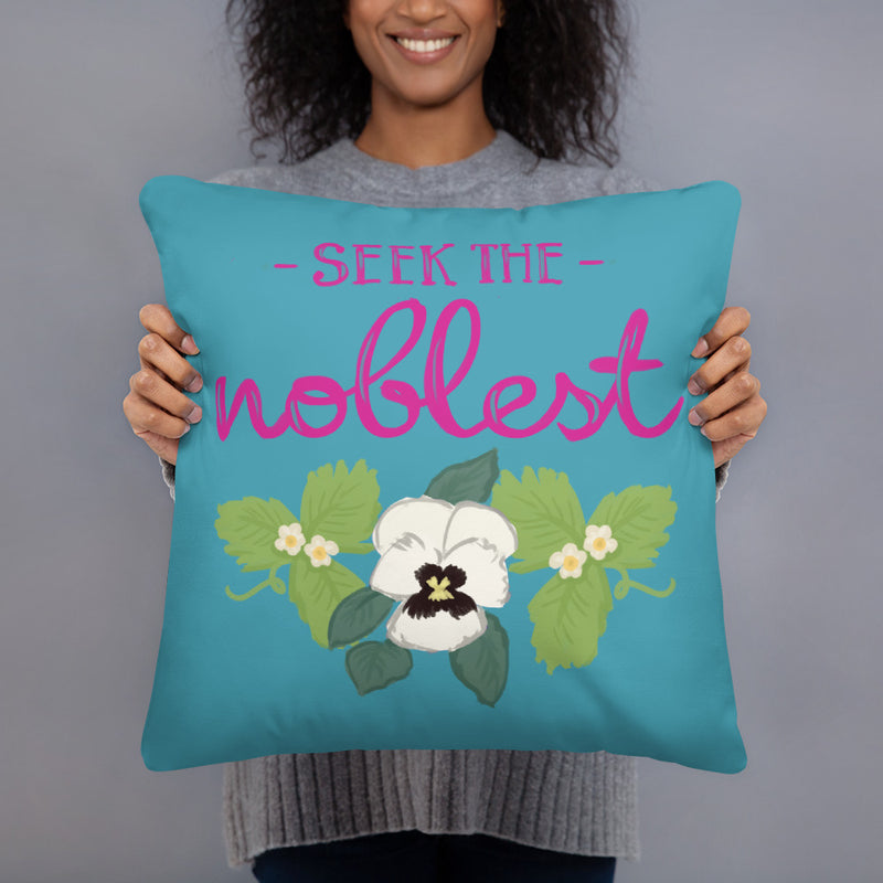 Zeta Tau Alpha Motto Pillow in turquoise held up by model