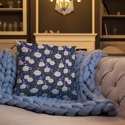 Delta Gamma Limited Edition 150th Anniversary, Two-Sided Pillow showing Navy floral print on back on couch