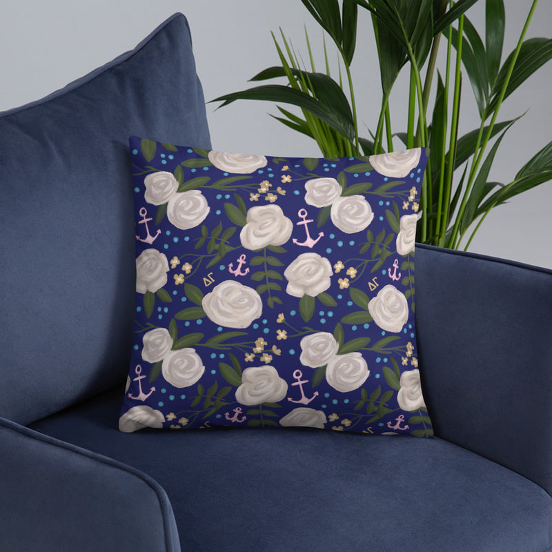 Upgrade your space instantly with our Delta Gamma "Hooked on DG" reversible two-sided pillow shown on chair