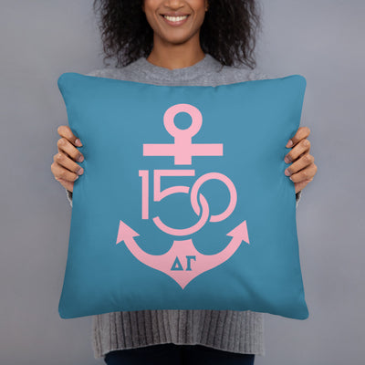 Delta Gamma 150th Anniversary pillow in teal and pink with floral print on back 