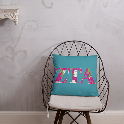 Zeta Tau Alpha Greek Letters Pillow, Turquoise shown on chair