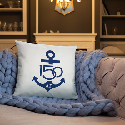 Delta Gamma Navy 150th Anniversary Two-Sided Pillow shown on couch