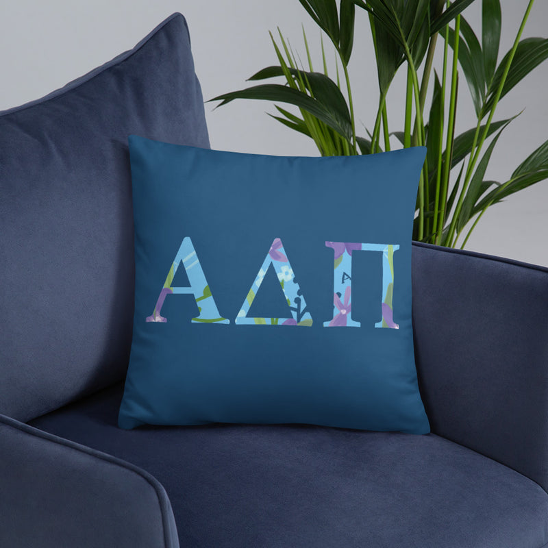 Alpha Delta Pi Greek Letters Pillow shown on chair