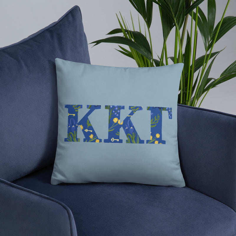 Kappa Kappa Gamma Greek Letters Pillow shown on a chair