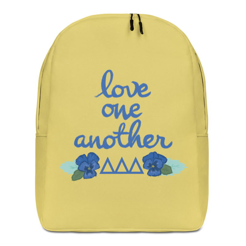 Tri Delta Love One Another Gold Backpack showing front of backpack