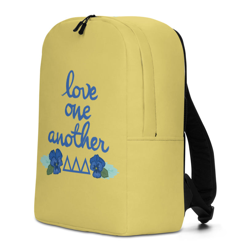 Tri Delta Love One Another Gold Backpack showing right side of backpack